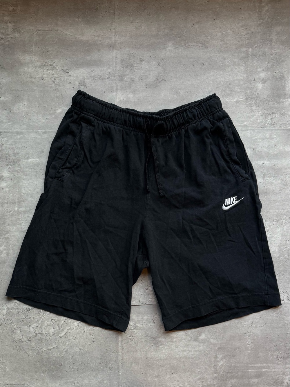 Nike Men's Black Athletic Shorts with White Swoosh